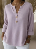 Lucía Maglietta Henley goffrata con bottoni